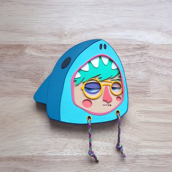 Video showing a variant of a character in a blue shark hoodie frame.